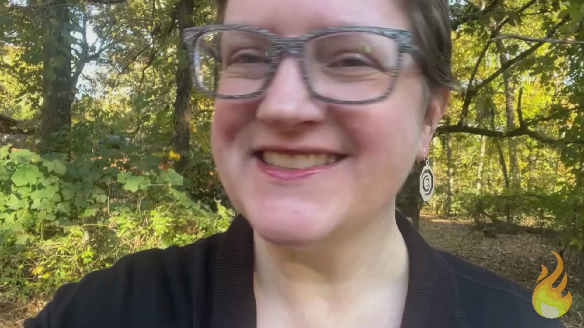 Video showing octagonal wooden red oak and sterling silver earrings being worn by a woman and then held in a hand on an earring card along with facts about its sustainability and that it is made in the USA.