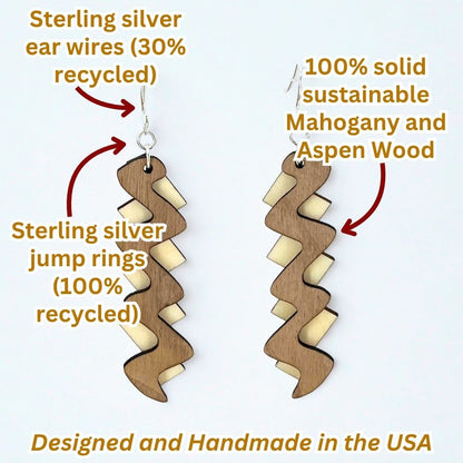 Wooden spiral earrings with text highlighting material and origin details on a white background